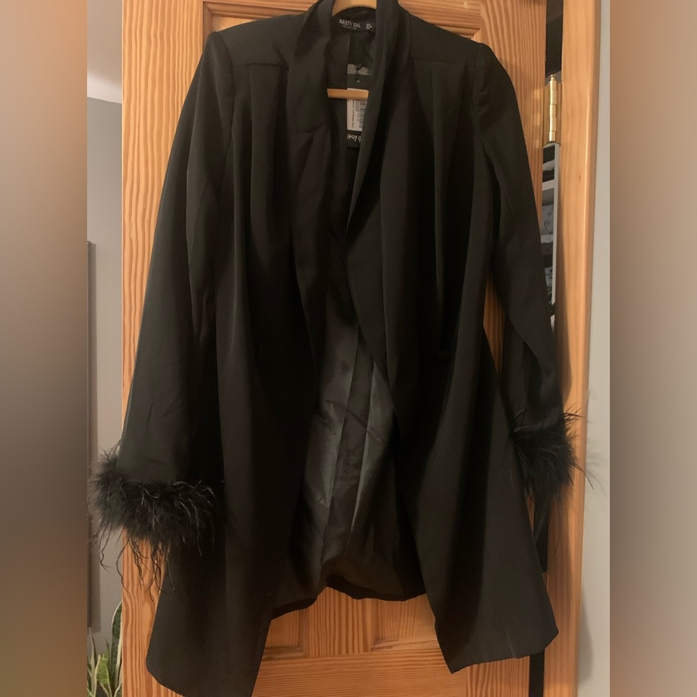 Feathered blazer coat never worn. Tags still on
